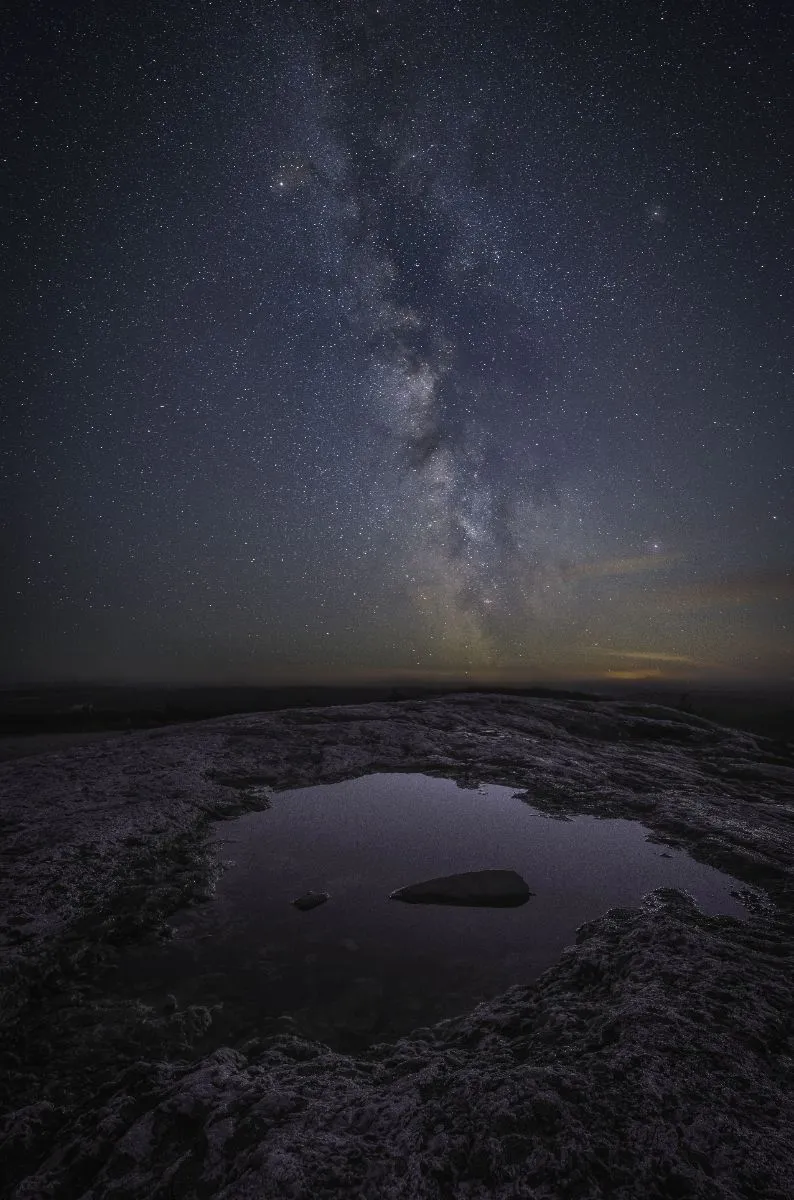 Milky Way over a rocky plateau