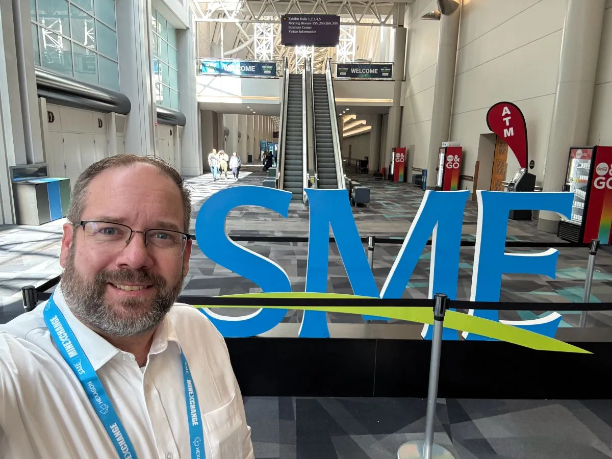 Team member at the SME conference entrance