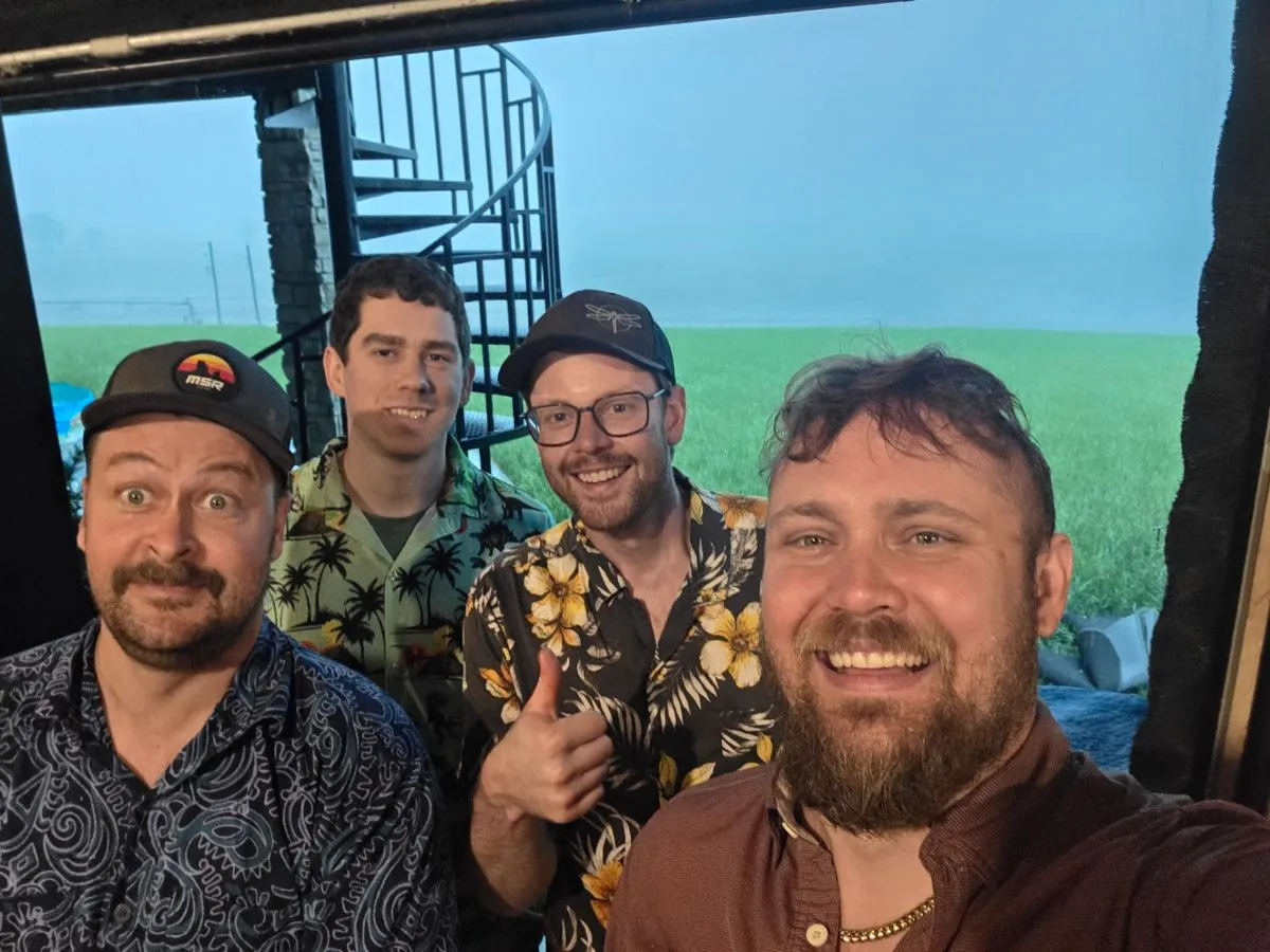 Four team members posing for a selfie in Nebraska